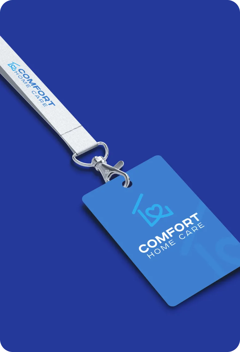 Comfort Home Care Employee ID Badge and Branded Lanyard | Comfort Home Care Comfort Home Care branded employee ID badge attached to a logo lanyard